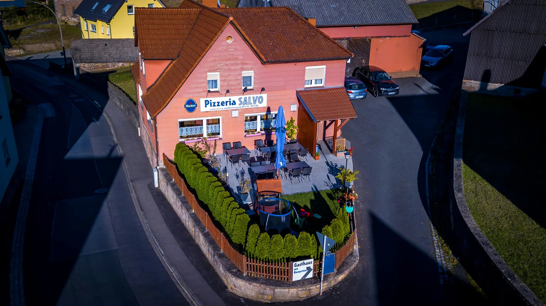 Luftaufnahme der Pizzeria Salvo an der Rhönstraße in Wollbach